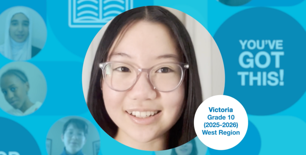 Grade 10 student with long dark hair, wearing glasses, upright and facing the camera. Photo centred on a blue graphic background.